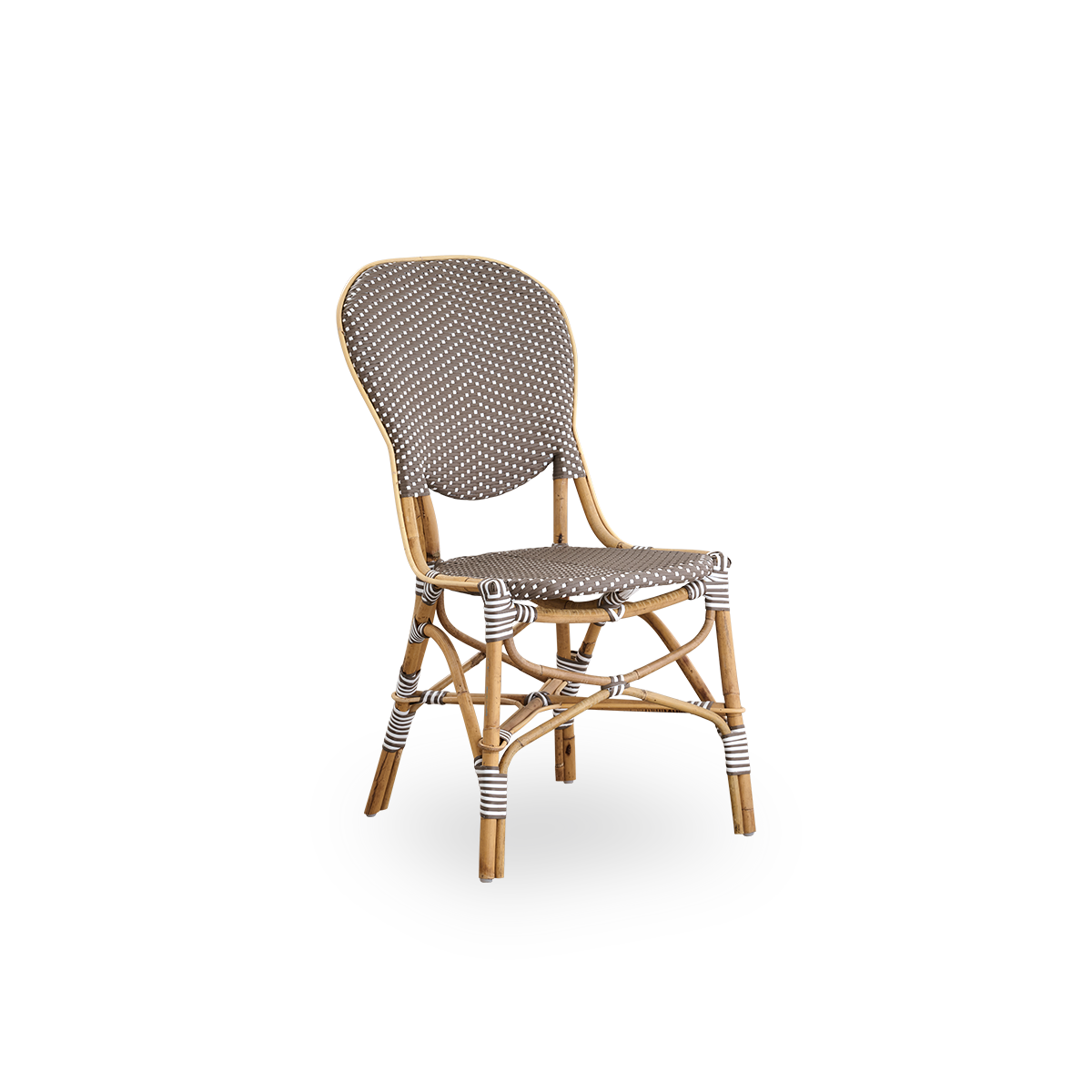Side view af Isabell spisestol. Rattanramme med sæde og ryg i brun ArtFibre med hvide prikker. Inspireret af 1950’ernes bistrodesign.