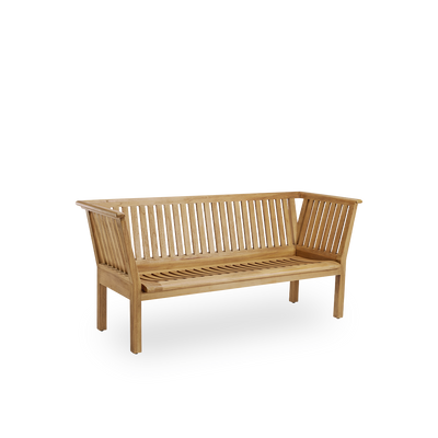 Side view af St Catherine udendørs teakbænk designet af Arne Jacobsen, længde 180 cm. Solid og holdbar bænk håndlavet i kastanjebrun, høj kvalitet Indonesisk teak certificeret som ‘Indonesian Legal Wood’.