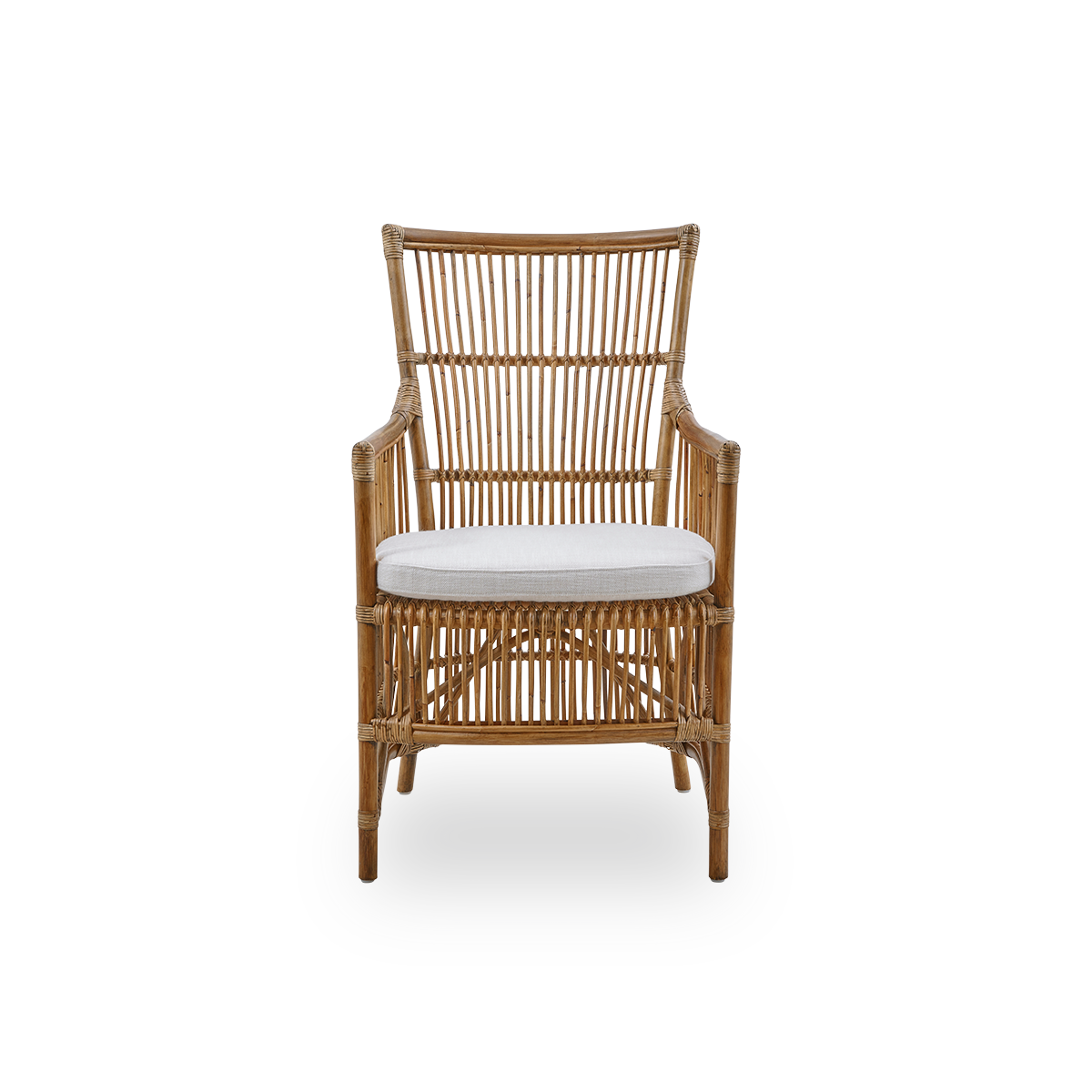 Front view of the Davinci dining chair in antique brown color. A wicker chair with armrests and a high back, handcrafted from high-quality Indonesian rattan.