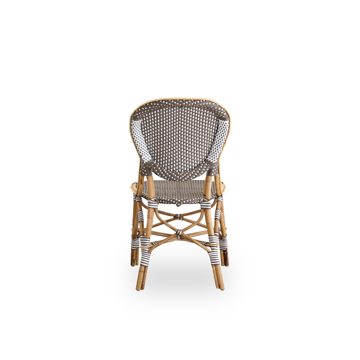 Bagfra vinkel af Isabell spisestol. Rattanramme med sæde og ryglæn i brun ArtFibre med hvide prikker. Inspireret af bistrodesign fra 1950’erne.