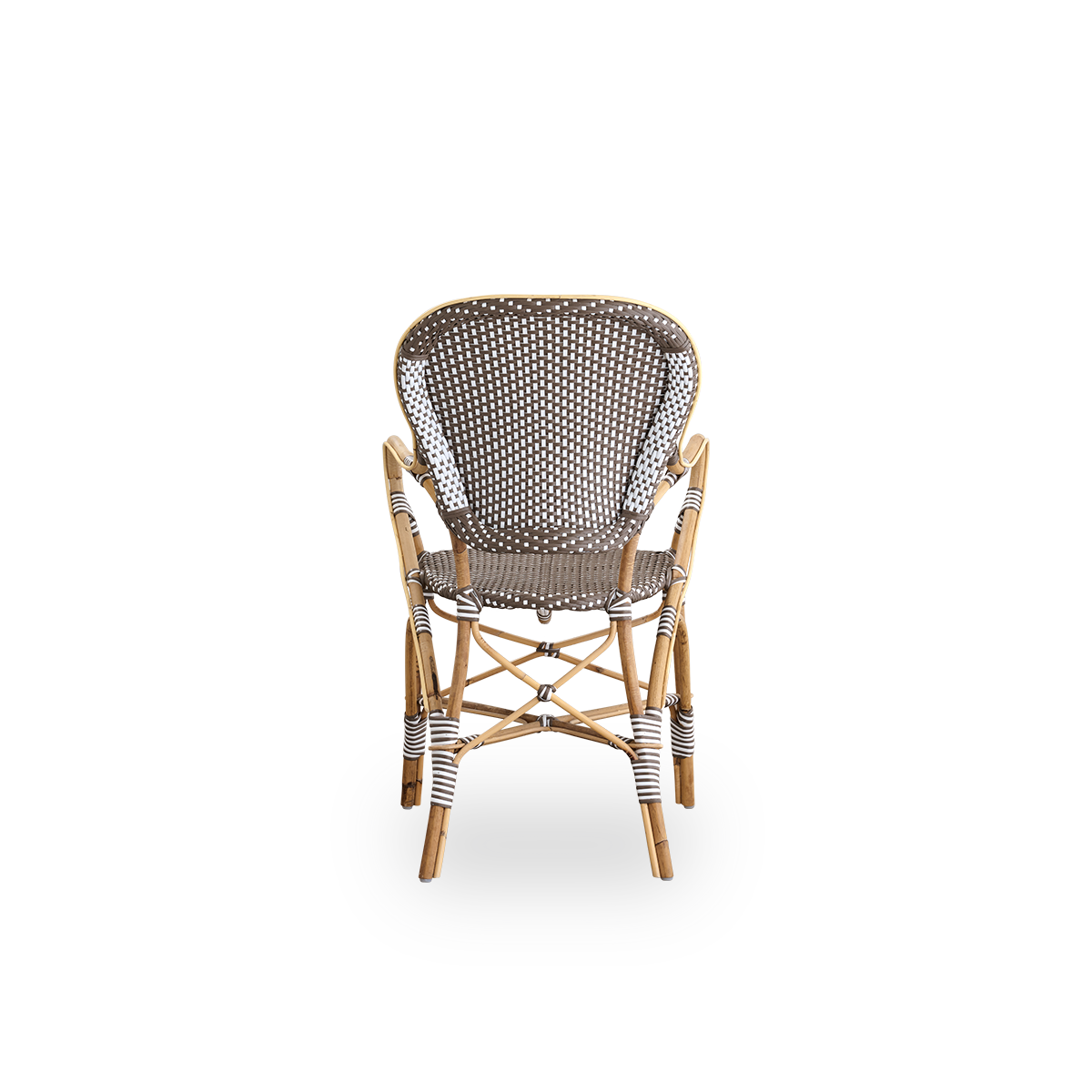 Bagfra vinkel af Isabell spisestol med armlæn. Rattanramme med sæde og ryglæn i brun ArtFibre med hvide prikker. Inspireret af bistrodesign fra 1950’erne.
