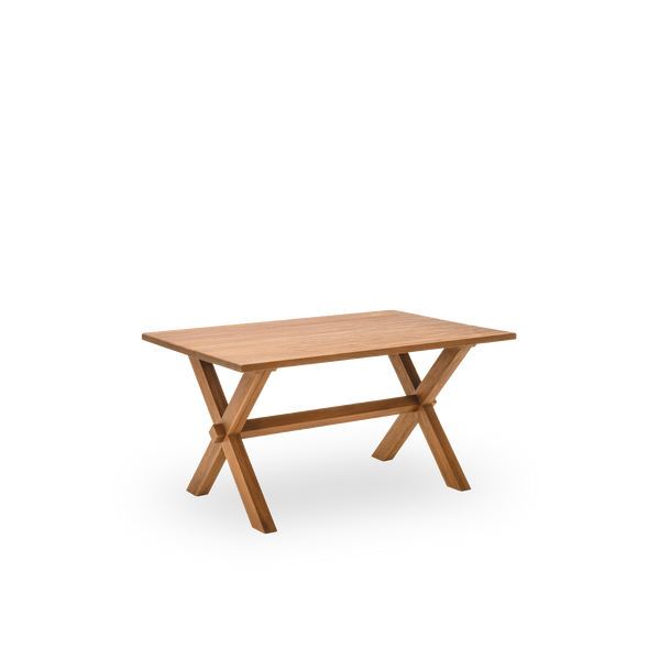 Sidevisning af Hugo spisebord, 140x90 cm, i teak med en naturlig, patineret overflade. Overfladebehandlet så træets naturlige åretegning træder frem, med plads til fire. Fremstillet i teak certificeret som Indonesian Legal Wood.