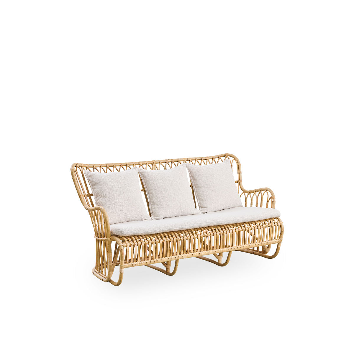 Side view af Tulip kurvestol-sofa designet af Tove Kindt-Larsen med bløde, organiske linjer. Håndlavet i høj kvalitet Indonesisk rattan.