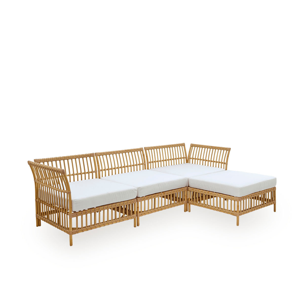 Plain side view of Maggie outdoor sofa corner module in Natural color presented with white seat and back cushion. Aluminium frame with handpainted rattan look with ArtFibre windings.