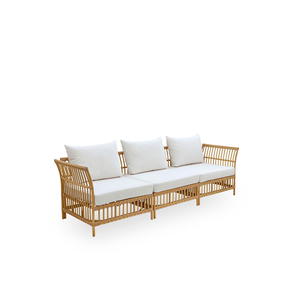 Plain back view of Maggie outdoor sofa corner module in Natural color presented with white seat and back cushion. Aluminium frame with handpainted rattan look with ArtFibre windings.