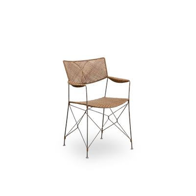 Side view af Rap spisestol designet af Yuzuru Yamakawa. Stålranke med sæde og ryg håndflettet i indonesisk rattan, let stol der kombinerer japansk design med traditionelt indonesisk håndværk.